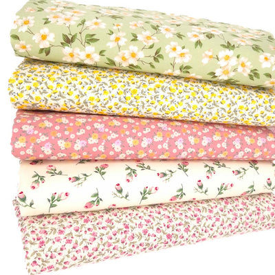 A fat quarter bundle of five ditsy floral prints by Rose & Hubble