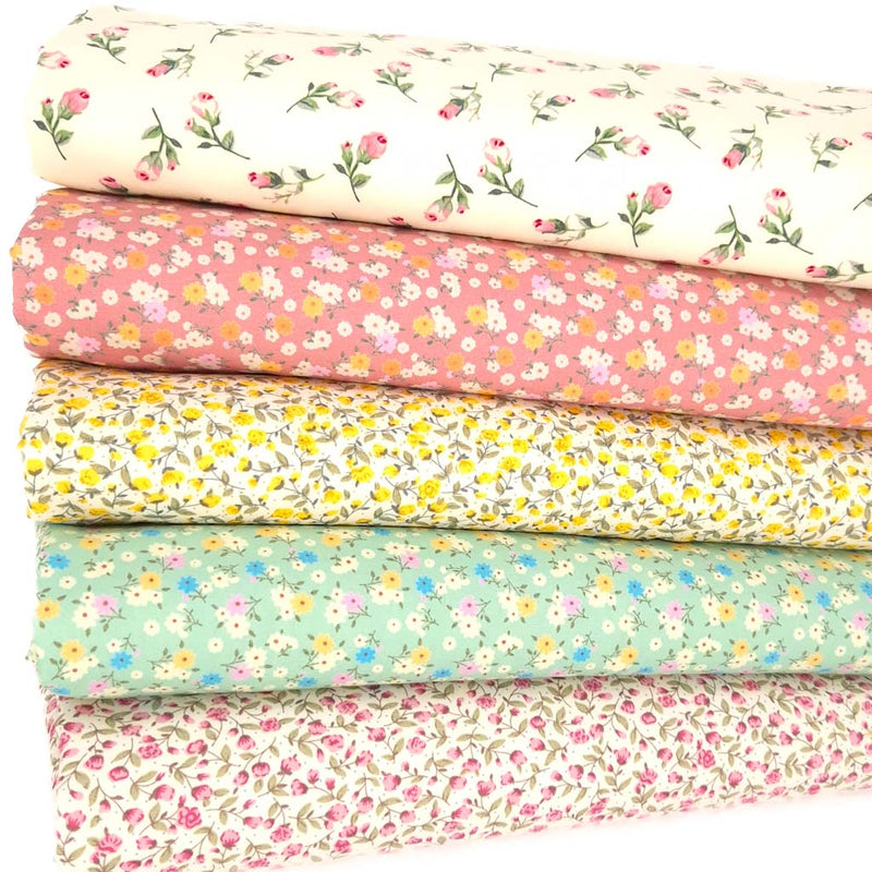 A fat quarter bundle of five ditsy floral prints by Rose & Hubble