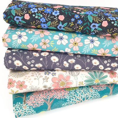 A floral fat quarter bundle in teal, peach and black colourways