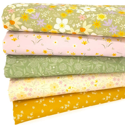 A fat quarter bundle of five Lewis & Irene Joy of Spring cotton fabrics in green