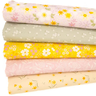 A fat quarter bundle of five Lewis & Irene Joy of Spring cotton fabrics in pink