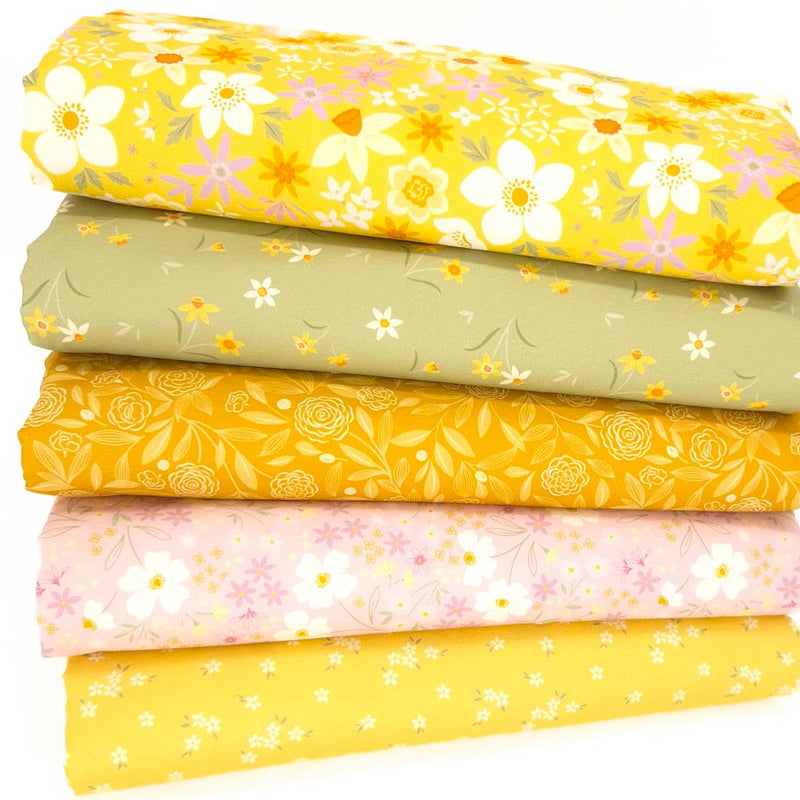 A fat quarter bundle of five Lewis & Irene Joy of Spring cotton fabrics in yellow