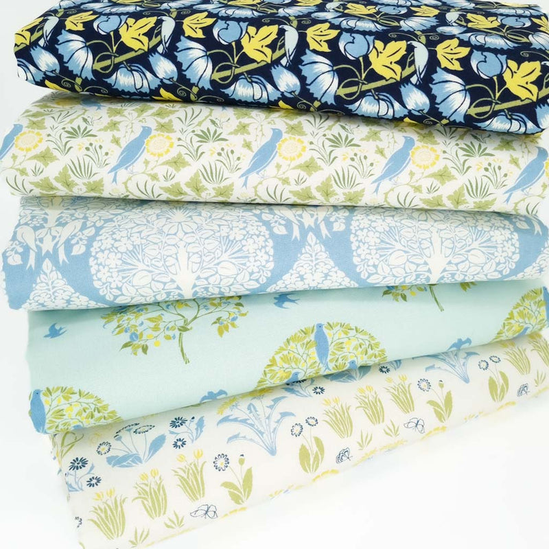 A cotton fat quarter bundle of five floral and bird designs in navy, sky and yellow colourways