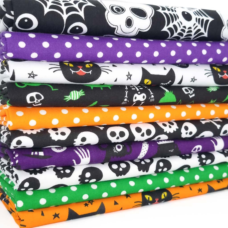 A fat quarter bundle of 10 halloween prints in green, orange, purple, black and white colourways