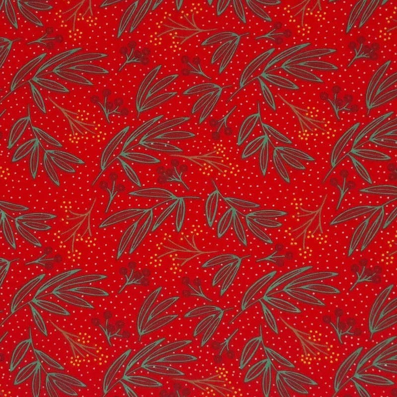 A festive holly fabric print on a red polycotton