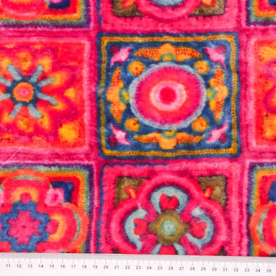 A 3D crochet design in pink printed on a cuddle fleece fabric with a cm ruler