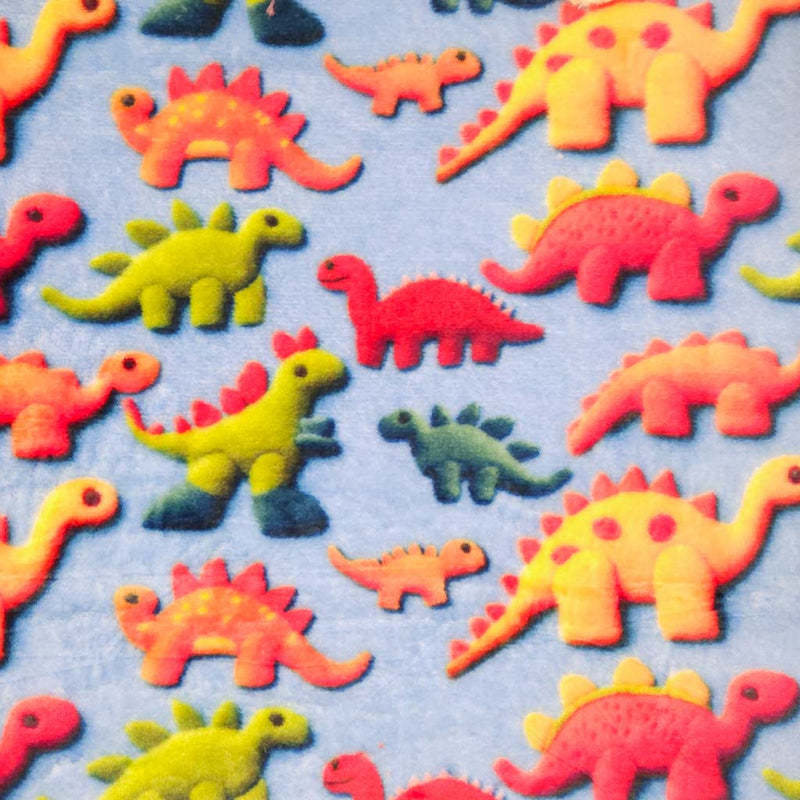 Pattern of colourful dinosaur toys on a blue cuddle fleece