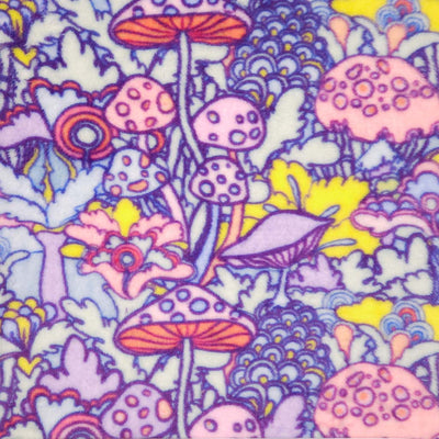 Colourful pattern of mushrooms and flowers with a psychedelic design printed on cuddle fleece fabric