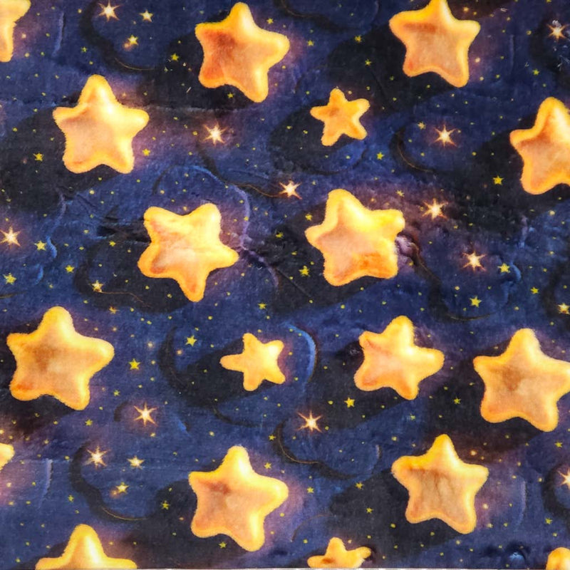 Pattern of yellow stars on a dark blue cuddle fleece fabric