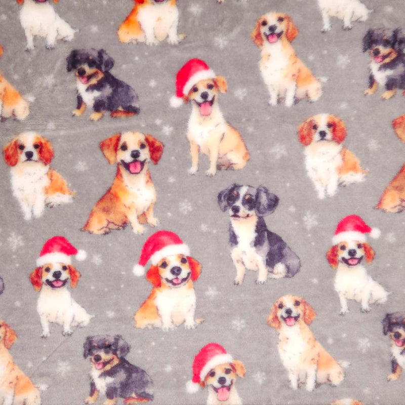 Pattern of dogs wearing Santa hats on a gray cuddle fleece with snowflakes.