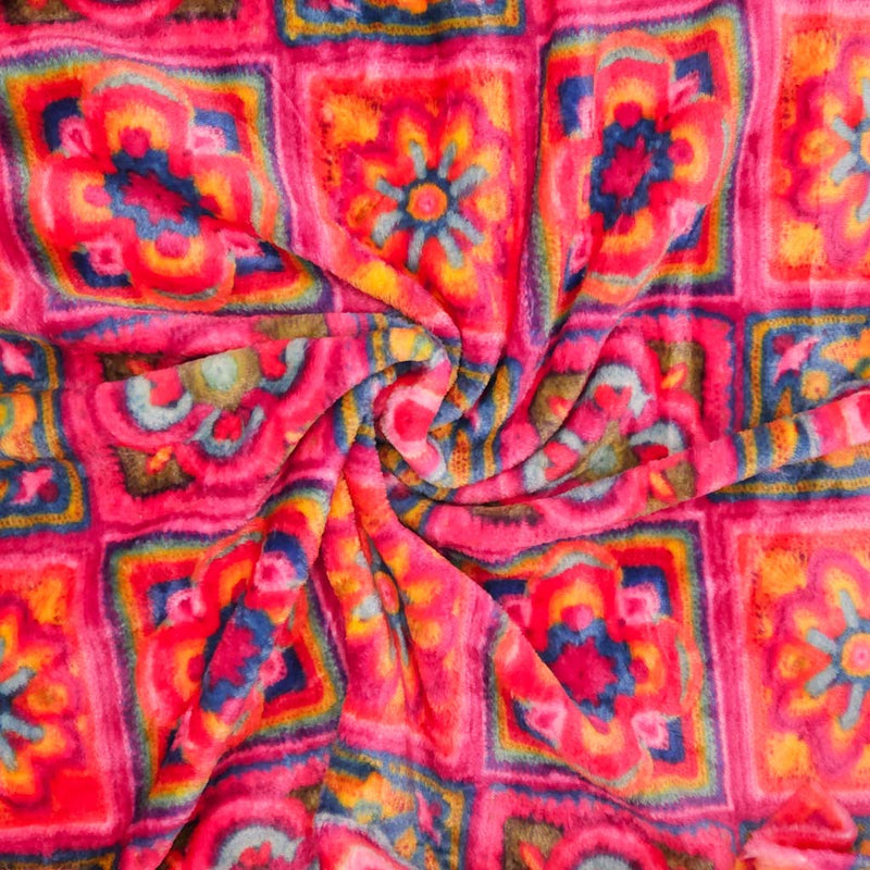 A 3D crochet design in pink printed on a cuddle fleece fabric with folds