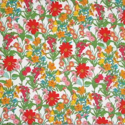 Vibrant red, orange and yellow flowers printed on a white cotton lawn fabric
