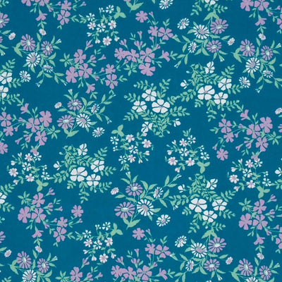 Calendula flowers are printed on this teal polycotton fabric