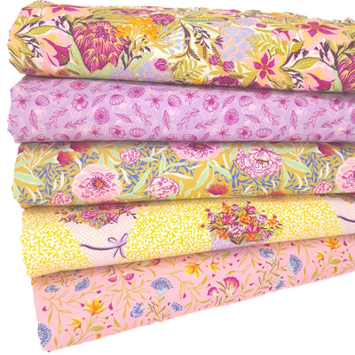 A fat quarter bundle of flower themed cotton fabrics