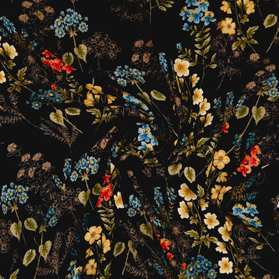 Floral pattern with red, yellow, and blue flowers on a black viscose marocaine
