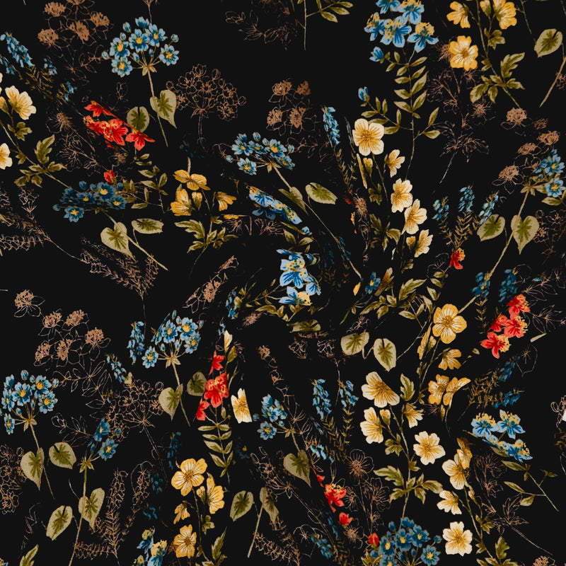 Floral pattern with red, yellow, and blue flowers on a black viscose marocaine