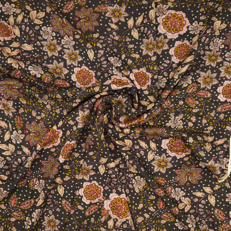 Floral pattern with multicolored flowers on a dark viscose fabric