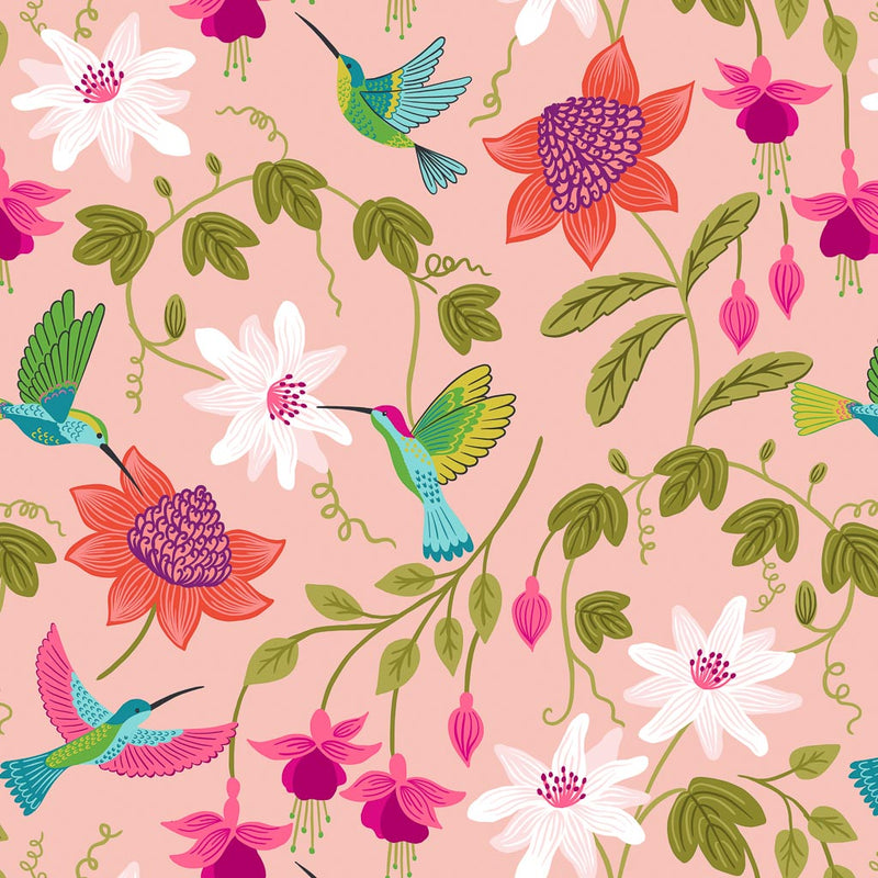 A large floral design featuring hummingbirds printed on a blush pink 100% cotton