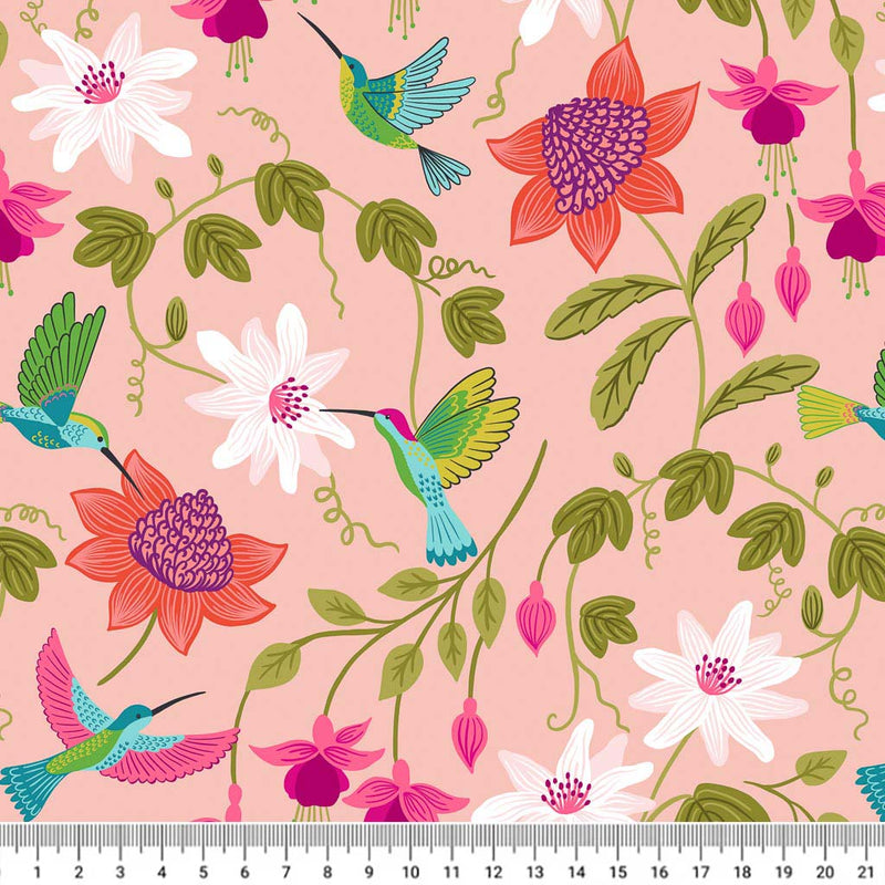 A large floral design featuring hummingbirds printed on a blush pink 100% cotton with a cm ruler