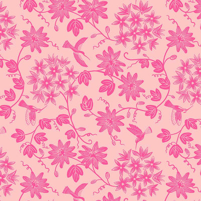 Hummingbirds and flowers printed on a pink cotton fabric
