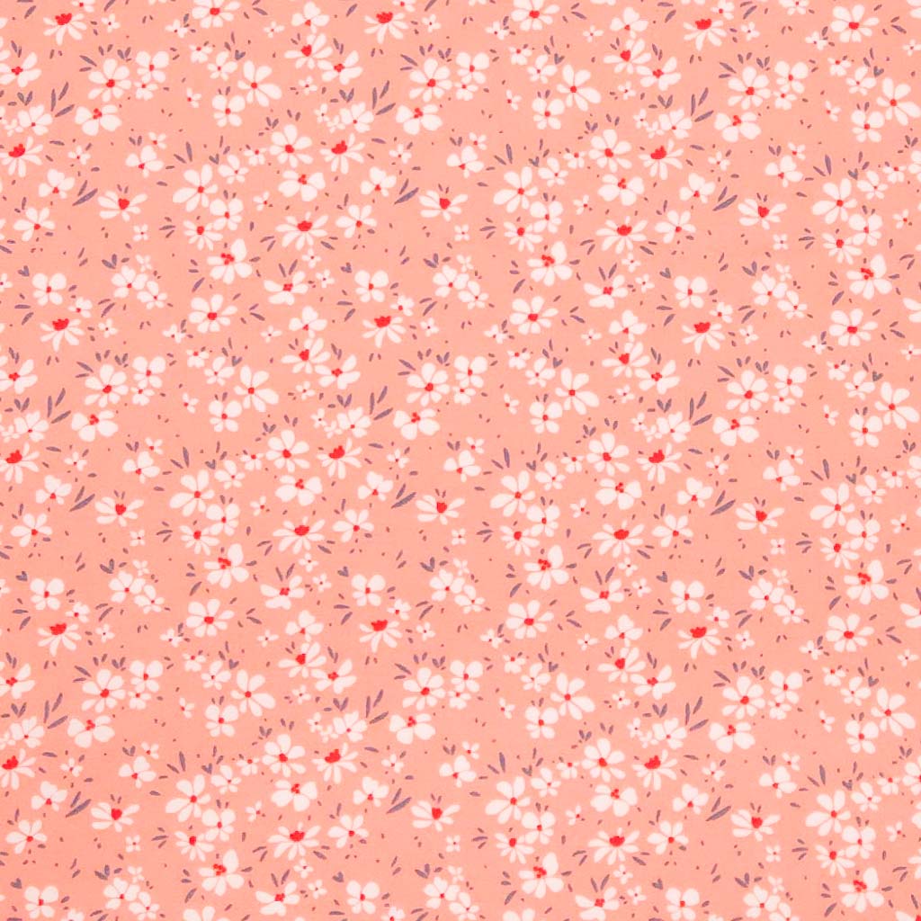 Ditsy floral on pink cotton poplin fabric