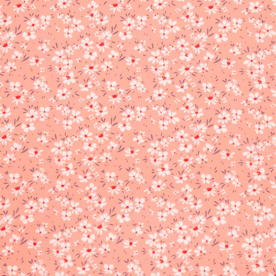 Ditsy floral on pink cotton poplin fabric