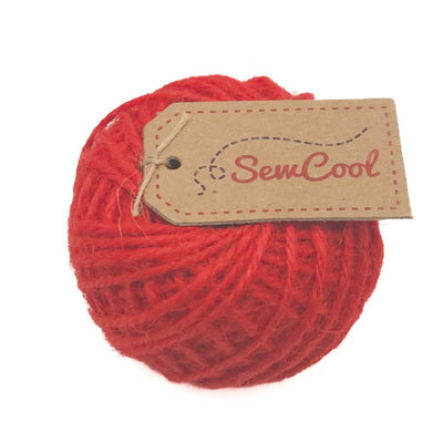 Red jute string ball with a 'Sew Cool' tag on a white background