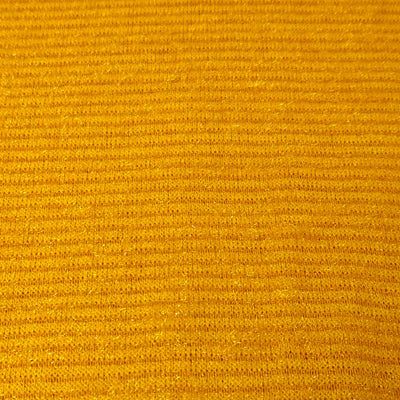 Close-up of a textured yellow fabric