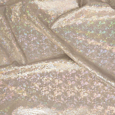 Close-up of iridescent glittery fabric with a soft focus.