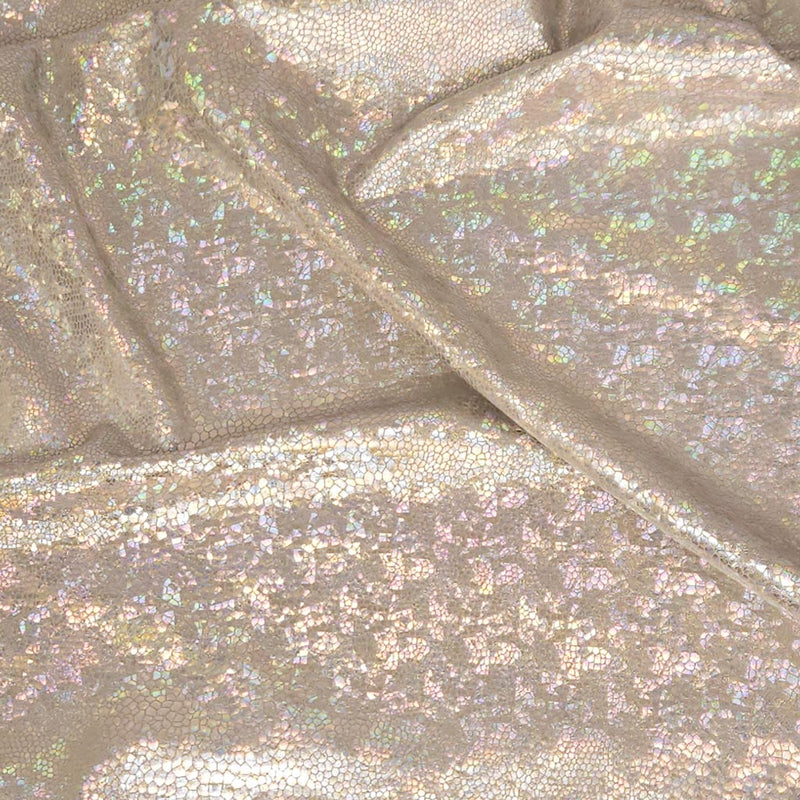 Close-up of iridescent glittery fabric with a soft focus.