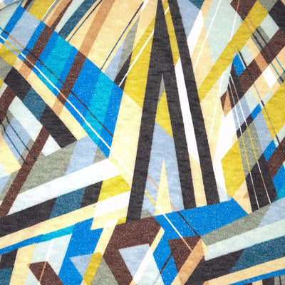 Close-up of a geometric pattern with blue, yellow, and brown colors.