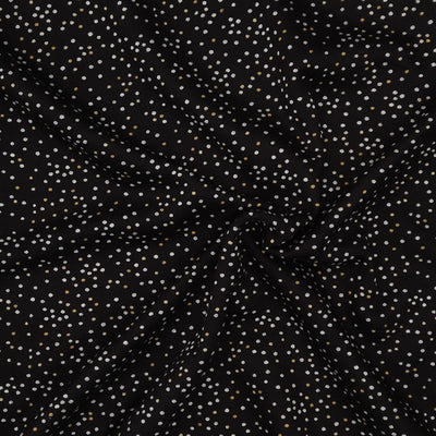 Black fabric with small white polka dots