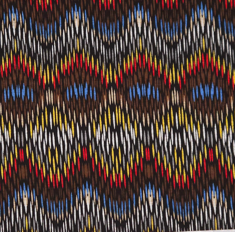 Patterned fabric with multicolor zigzag design on a brown ponteroma fabric