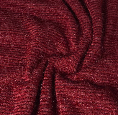 Close-up of textured red fabric with a wavy pattern