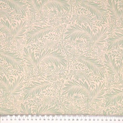 Larkspur in duck egg printed on a cream cotton fabric. With a cm ruler