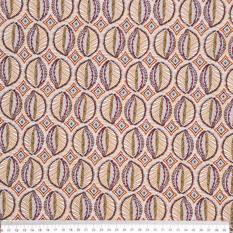 Patterned viscose fabric with geometric design on a white background with a cm ruler