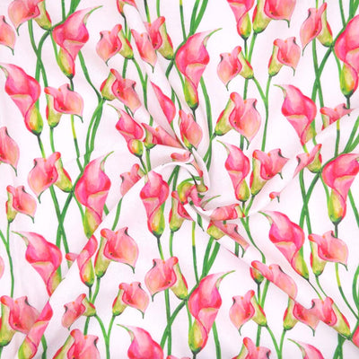 Pink lilies printed on a white linen viscose mix fabric