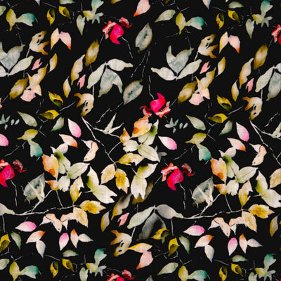 Pattern of colourful leaves on a textured black linen fabric