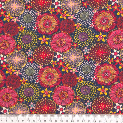 Firework flowers printed on a cotton fabric by Little Johnny with a cm ruler