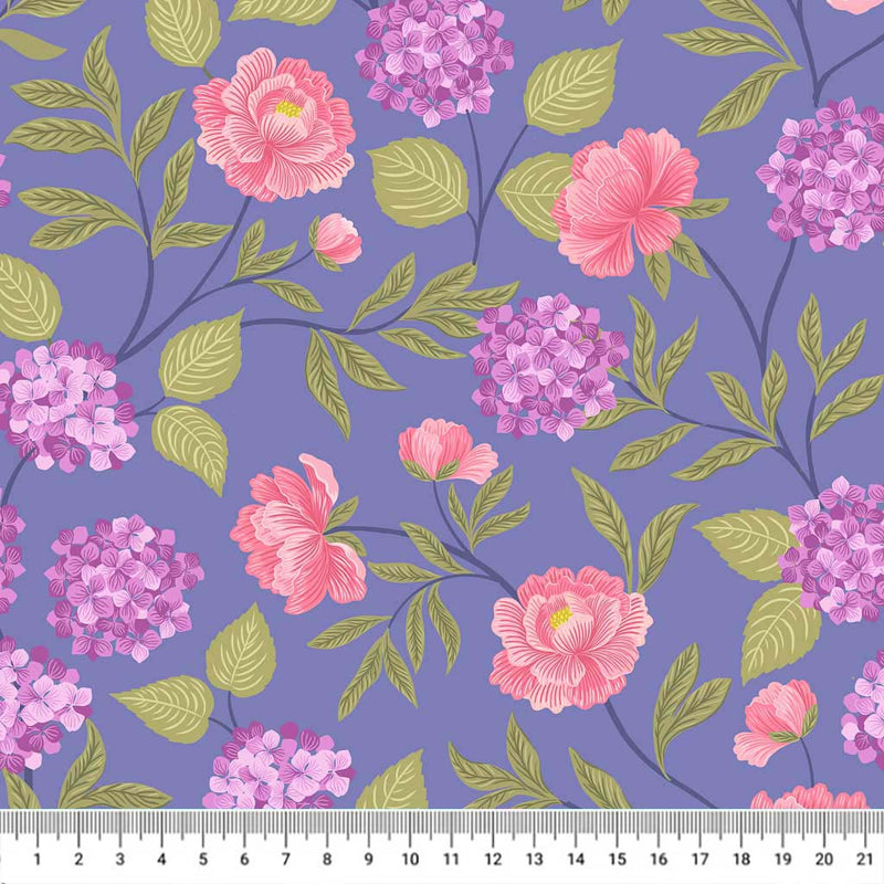 Hydrangeas and peonies are printed on an indigo blue quilting fabric