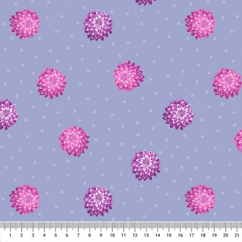 Dahlias are printed on an indigo blue quilting fabric by Lewis & Irene