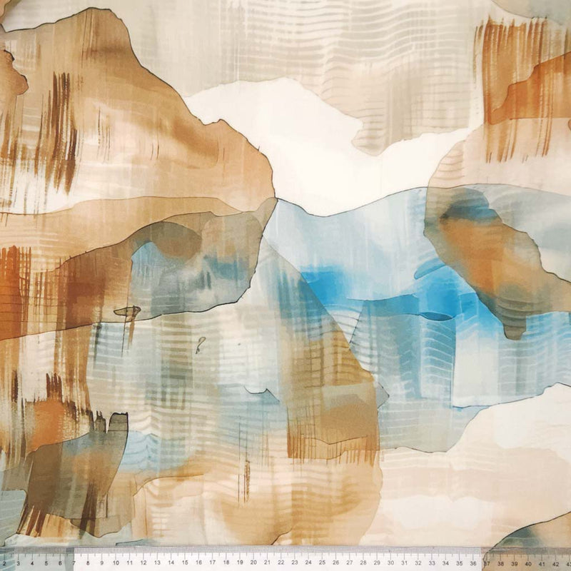 Abstract art with brown, blue, and white colours on a viscose twill fabric with a cm ruler