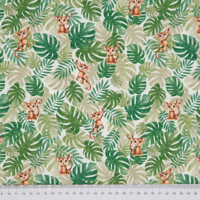 Monkeys and leaves printed on a cotton jersey with a cm ruler