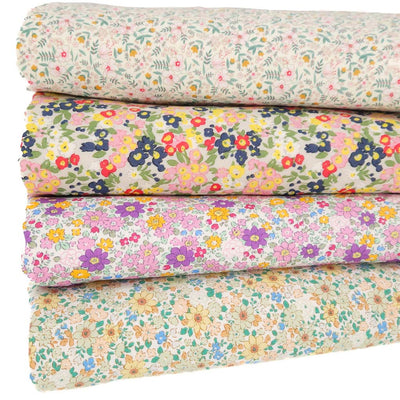 A fat quarter bundle of 4 ditsy floral designs