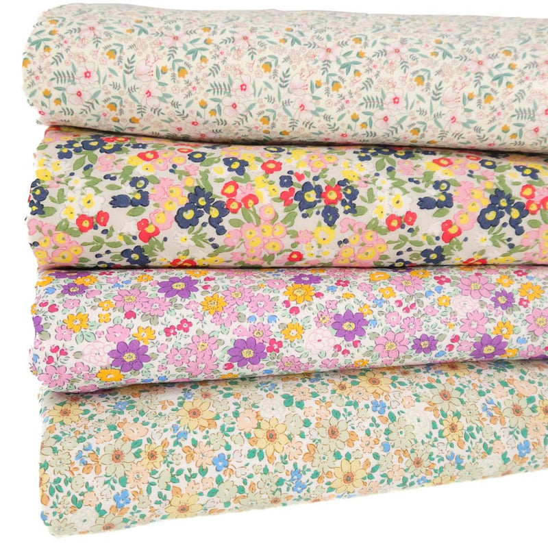 A fat quarter bundle of 4 ditsy floral designs
