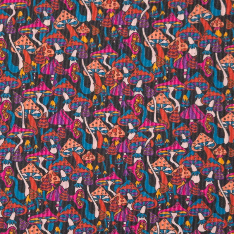 Psychedelic mushrooms printed on a black cotton needlecord fabric