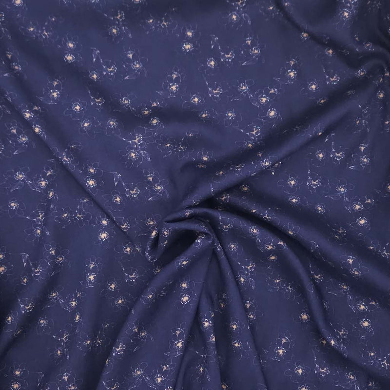 Navy blue fabric with small white floral pattern