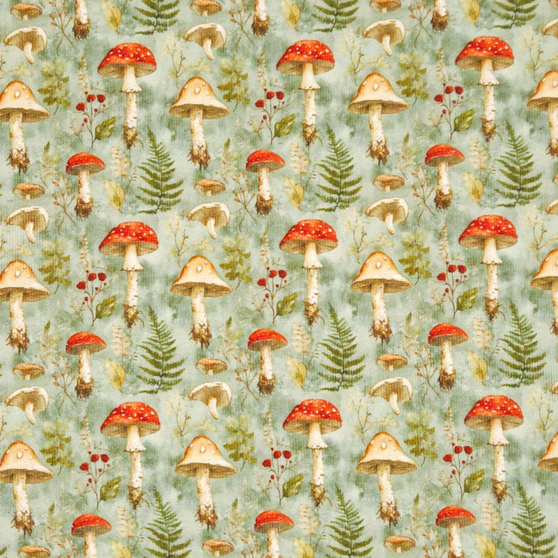 Pattern of mushrooms and ferns on a light green needlecord fabric