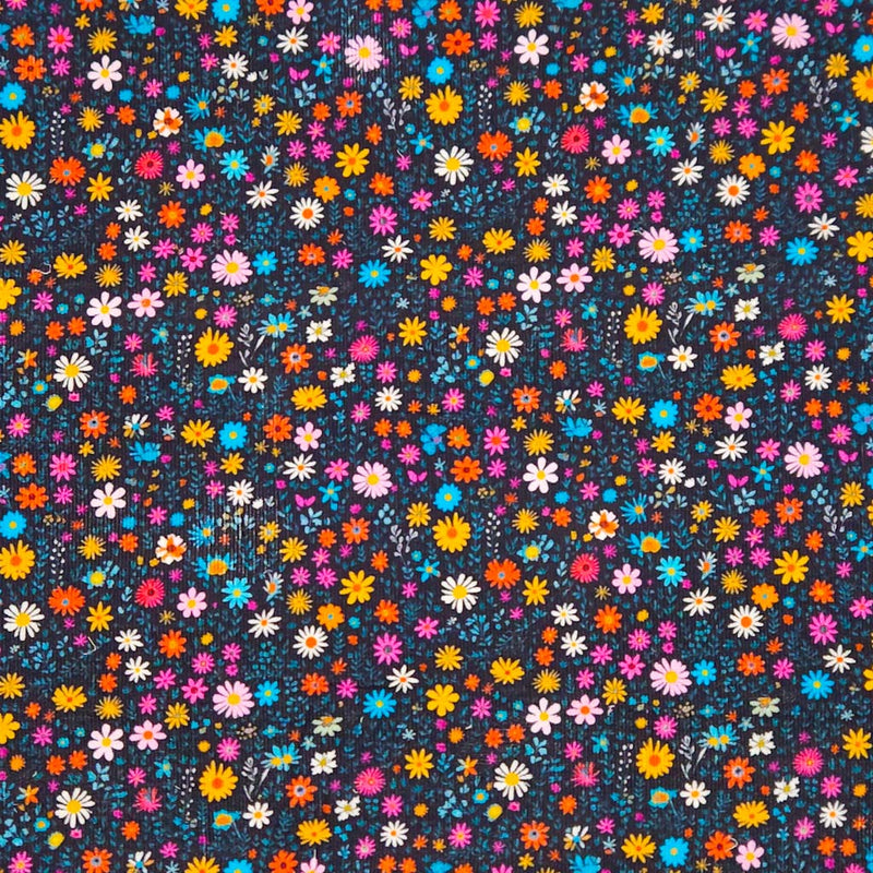 Pattern of colorful flowers on a dark needlecord fabric