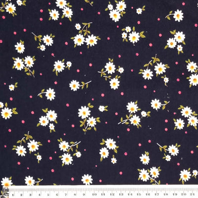 corduroy fabric featuring a cute, daisy and spots design is made from 100% cotton fibres with ruler